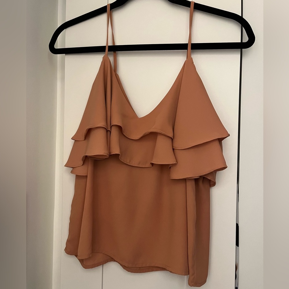 Flared flow summer tank